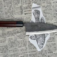 Japanese kitchen knife designed for heavy-duty work for skilled professionals or experienced home users. Especially well-suited for "big game" fishing enthusiasts! The double-bevel quality means easier sharpening and makes this deba ideal for heavier tasks such as cutting through the bones of large fish and chicken.