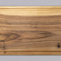 Handcrafted by Slovenian woodworker J. Gros, these cutting boards are made from walnut wood, known for strength and durability. This extra large cutting board offers plenty of space for comfortable and lengthy chopping – either at home or in a professional kitchen. It also makes a great presentation or serving board.