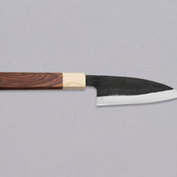 This Ajikiri SUJ-2 blade made by Yoshida Hamono is a Japanese knife for small fish. It's fitted with an octagonal rosewood handle which is topped with a cedar ferrule. The blade is forged from SUJ-2 steel with a hardness is 63-64 HRC, which holds its edge for a long time and is very easy to resharpen.