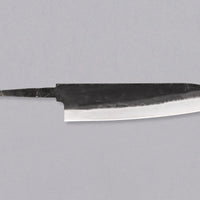 Yoshida Gyuto SUJ-2 Kuro-uchi 210mm (8.3") is a multi-purpose blade made in the Japanese smithy Yoshida Hamono. It's made from high-carbon SUJ-2 steel, so it is easy to sharpen and stays sharp for a long time. With its minimalist kuro-uchi look it will combine well with both classic and more extravagant handles.