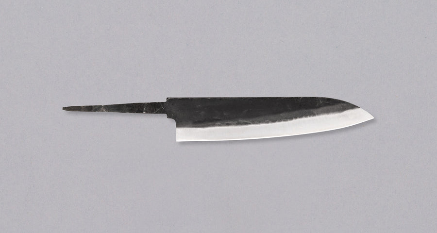 Yoshida Gyuto SUJ-2 Kuro-uchi 210mm (8.3") is a multi-purpose blade made in the Japanese smithy Yoshida Hamono. It's made from high-carbon SUJ-2 steel, so it is easy to sharpen and stays sharp for a long time. With its minimalist kuro-uchi look it will combine well with both classic and more extravagant handles.