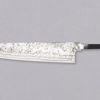 Yoishida Gyuto ZDP-189 damascus in 240mm length. The blade is made from the best powder steel, ZDP-189, so it's rust-resistant, low-maintenance, and keeps a super sharp edge for a very long time. At 240mm (9.4"), this gyuto is the perfect length for all cutting work in the kitchen, be it making steaks or chopping veg, as long as it is accompanied by a trusty petty for all those smaller, in-hand tasks.