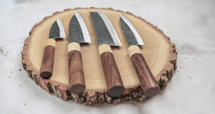 This Nakiri Kyusyu SUJ-2 blade is fitted with an oval rosewood handle, topped with a cedar ferrule. A traditional Japanese knife for cutting vegetables. The blade is forged from SUJ-2 steel with a hardness is 63-64 HRC, which holds its edge for a long time and is very easy to resharpen.