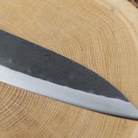 This Santoku Funayuki SUJ-2 blade is fitted with an oval rosewood handle with a cedar ferrule. Great for cutting smaller pieces of meat and filleting fish.  The blade is forged from SUJ-2 steel, which offers incredible capacities, hardness is 63-64 HRC, and at the same time, the knife is very easy to resharpen. 