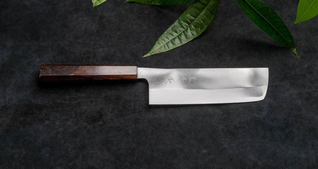 Kurosaki Nakiri Gekko from the Gekko line is the work of a talented master blacksmith Yu Kurosaki. The minimalistic, lightweight, perfectly balanced blade is treated to a high polish. The knife features new VG-XEOS steel (61 HRC), which has excellent resistance to wear and corrosion, and is fitted with an oak handle.