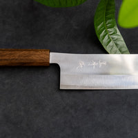 Kurosaki Nakiri from the Gekko line is another uniquely looking blade from the hands of a talented young master blacksmith Yu Kurosaki. The minimalistic, lightweight blade is treated to a high polish. The secret of this knife lies in a new VG-XEOS steel (61 HRC), which has excellent resistance to wear and corrosion.