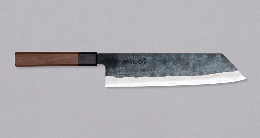 The Gyuto design is intended for versatile use for chefs who prefer medium size multi-purpose knife, suitable to cut meat, fish and vegetables. ZDP-189 Gyuto Black is manufactured at the smithery of Yoshida Hamono in Japan, a family company with an age-long tradition in manufacturing state-of-the-art tools by hand.