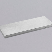 Atoma Diamond sharpening stone from Japanese manufacturer Tsuboman with #140 grit is a very rough diamond plate, suitable for flattening sharpening whetstones and repairing damaged blades. It removes material very quickly (both from whetstones and knives), and works very well with all types of steel. 