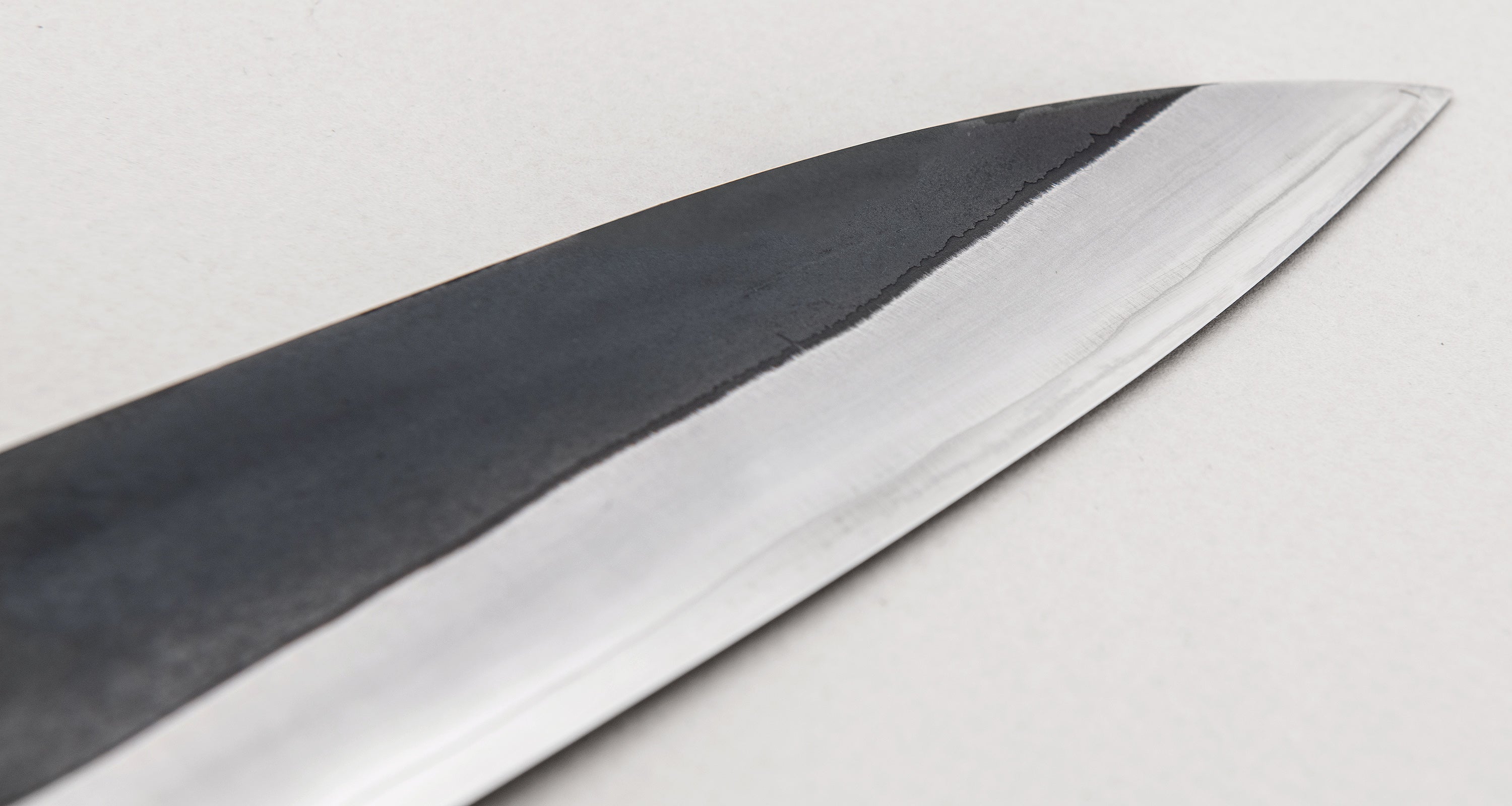 https://sharpedgeshop.com/cdn/shop/products/HAP-40-Wide-Gyuto-Black-240mm_00158_00164.jpg?v=1632853896