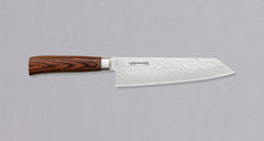 Kengata refers to the shape of the blade similar in usage to a Chef’s knife, but with a more striking look. The blade is finished off with a reversed tanto tip (also known as K-tip). The profile and length are suitable for both long and short cuts, the curve of the belly enables chopping on a kitchen board and the sharp tip excels at tasks where precision is key. The core of the blade has a high-polish finish and is forged out of VG-5 steel .