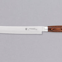 Tamahagane "SAN" Pankiri (Bread Knife) 230mm (9.1") bread knife is an indispensable tool for professional chefs and home cooks. It saws through soft bread without much pressure and glides effortlessly through hard crusts. Suitable for slicing a roast or any large piece of meat, as well as cakes, sushi, tomatoes etc.